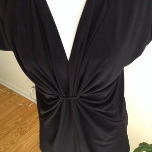 Rich black jersey top with attitude by Chaus.  M